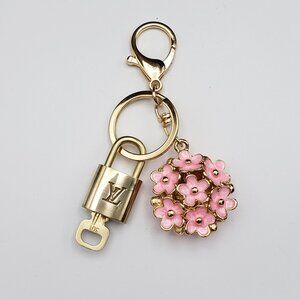 Authentic Louis Vuitton Lock & Key with Unbranded Flower Charm, Keychain
